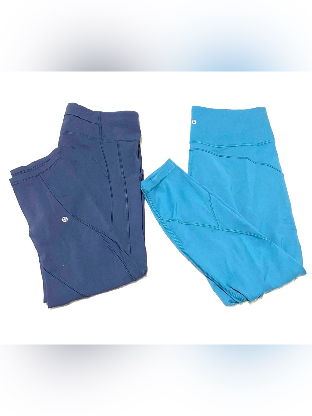 lululemon pair of “in movement”Leggings in Navy and Teal Blue